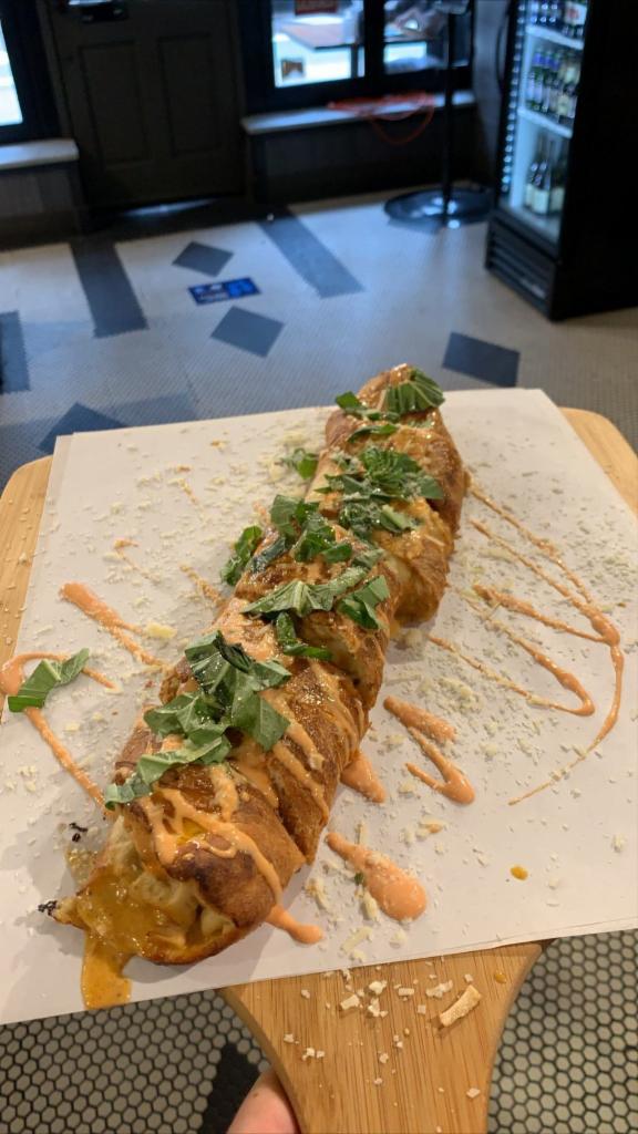 Buffalo Chicken Roll · Buffalo chicken roll, stuffed with Grande mozzarella cheese and buffalo chicken ,
Serves with side of blue cheese dressing .