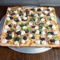 11. Blackberry and Ricotta Pizza · Fresh blackberries, ricotta, pecans and spicy honey and topped with fresh basil.