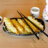 Prawn Tempura · (5 pcs) Lightly battered shrimp served with tempura dipping sauce