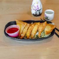 Crab Rangoons · (6 pcs) Crispy wonton wrapped with crab and cream cheese filling. Served with house made swe...