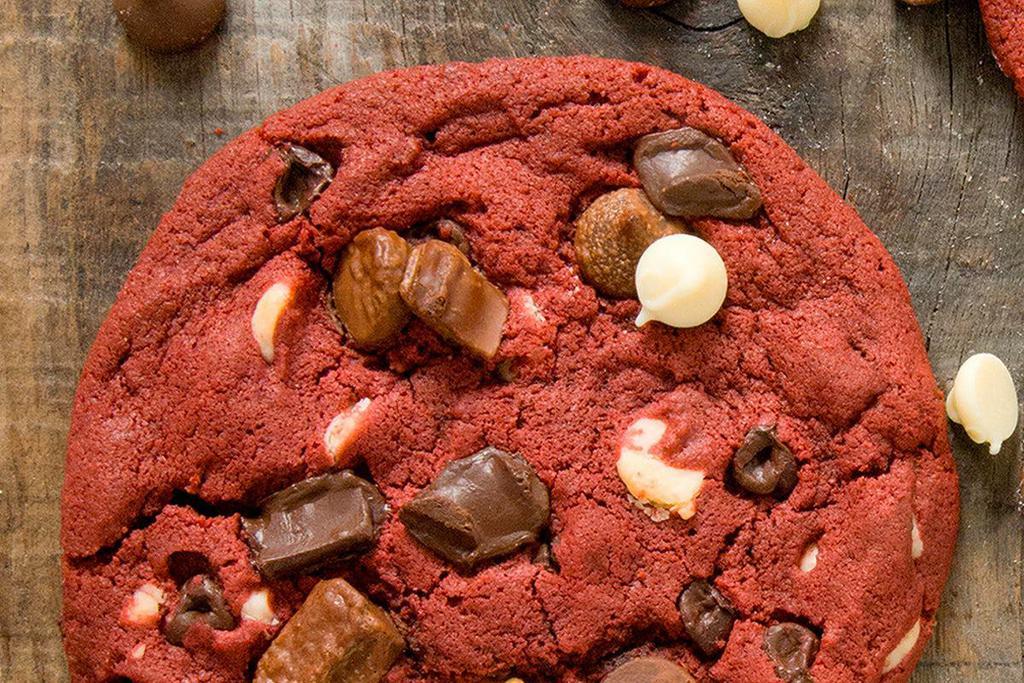 Red Velvet Cookie · Made with white chocolate chips, Hershey's® milk chocolate, semi sweet chocolate chunks, and milk chocolate chunks to create a decadent and irresistible cookie.