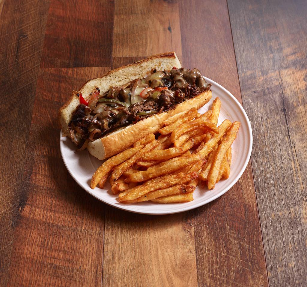 Moonshine Philly Sandwich · Shaved steak, marinated in a moonshine marinade with sauteed bell peppers, mushrooms, onions, provolone and mayo. Served on a sub roll.