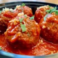 Beef Meatballs · Beef meatballs in marinara sauce, topped with parmesan cheese
