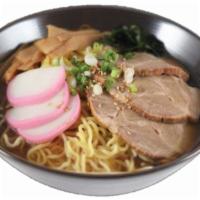 11. Shoyu Pork Ramen · Pork slices, fish cake, bamboo, seaweed, green onions, shoyu broth, and ramen noodles.