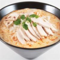 5. Chicken Tom Kah · Sliced chicken, mushroom, cilantro, green onions, lemongrass, coconut soup, and rice stick n...