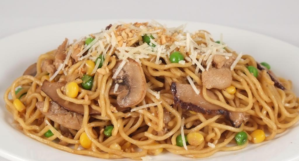 24. Garlic Noodles · Choice of protein, Japanese noodles, white and shitake mushrooms, corn, peas, butter, garlic, and Parmesan cheese.