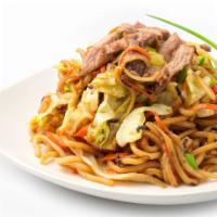 25. Yakisoba · Choice of protein, yakisoba noodles, cabbage, carrots, onions, mushrooms, sesame seeds, and ...
