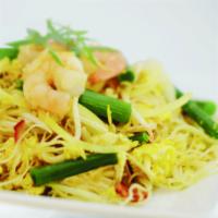 26. Singapore Noodles · BBQ Pork and shrimp, curry powder, eggs, onions, green onions, bean sprouts and rice vermice...