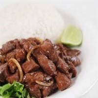 31. Beef Steak Rice · Diced beef steak, garlic, and sauteed onions.