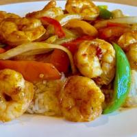 36. Shrimp Chili · Shrimp sauteed with jalapeno, bell peppers, garlic, onions.  Served with rice.  Spicy. 