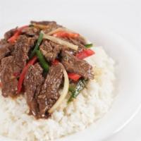 36. Beef Chili · Beef slices sauteed with jalapeno, bell peppers, garlic, onions.  Served with rice.  Spicy. 