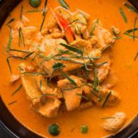 41. Panang Curry · Choice of protein, red panang curry with peas & carrots, zucchini, bell pepper and jalapeno.