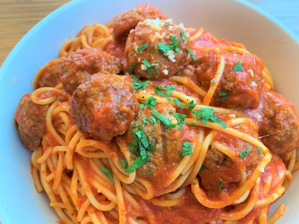 62. Spaghetti and Meatballs · Spaghetti & beef meatballs in tomato sauce, topped with parmesan cheese