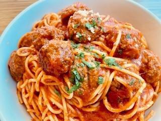 Spaghetti and Italian Mild Sausage · Spaghetti & Italian mild sausages in tomato sauce, topped with parmesan cheese