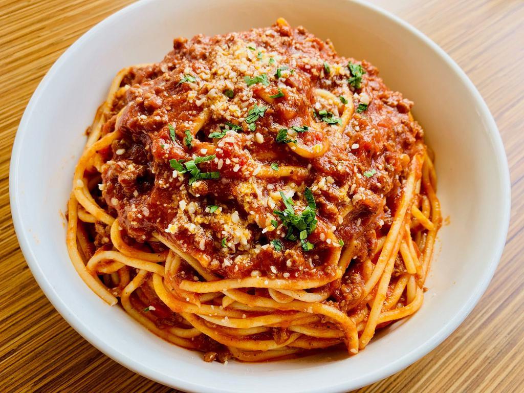 66. Spaghetti Bolognese · Spaghetti in homemade meat sauce
