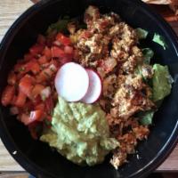 Chorizo Con Huevo · Scrambled eggs with Mexican chorizo. Served as a breakfast burrito in a flour tortilla with ...
