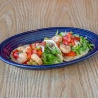 Camarones Taco · 2 tacos. Shrimp sautéed with mushrooms and bell pepper in white wine on a corn tortilla with...