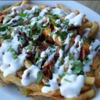 Loaded Fries. · Golden fries with melted jack and cheddar cheese topped fresh grilled onions, crispy bacon, ...