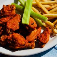 Wahoo’s Wings. · one pound of our large wings tossed on Buffalo, spicy bbq or sweet bbq sauce served fries an...