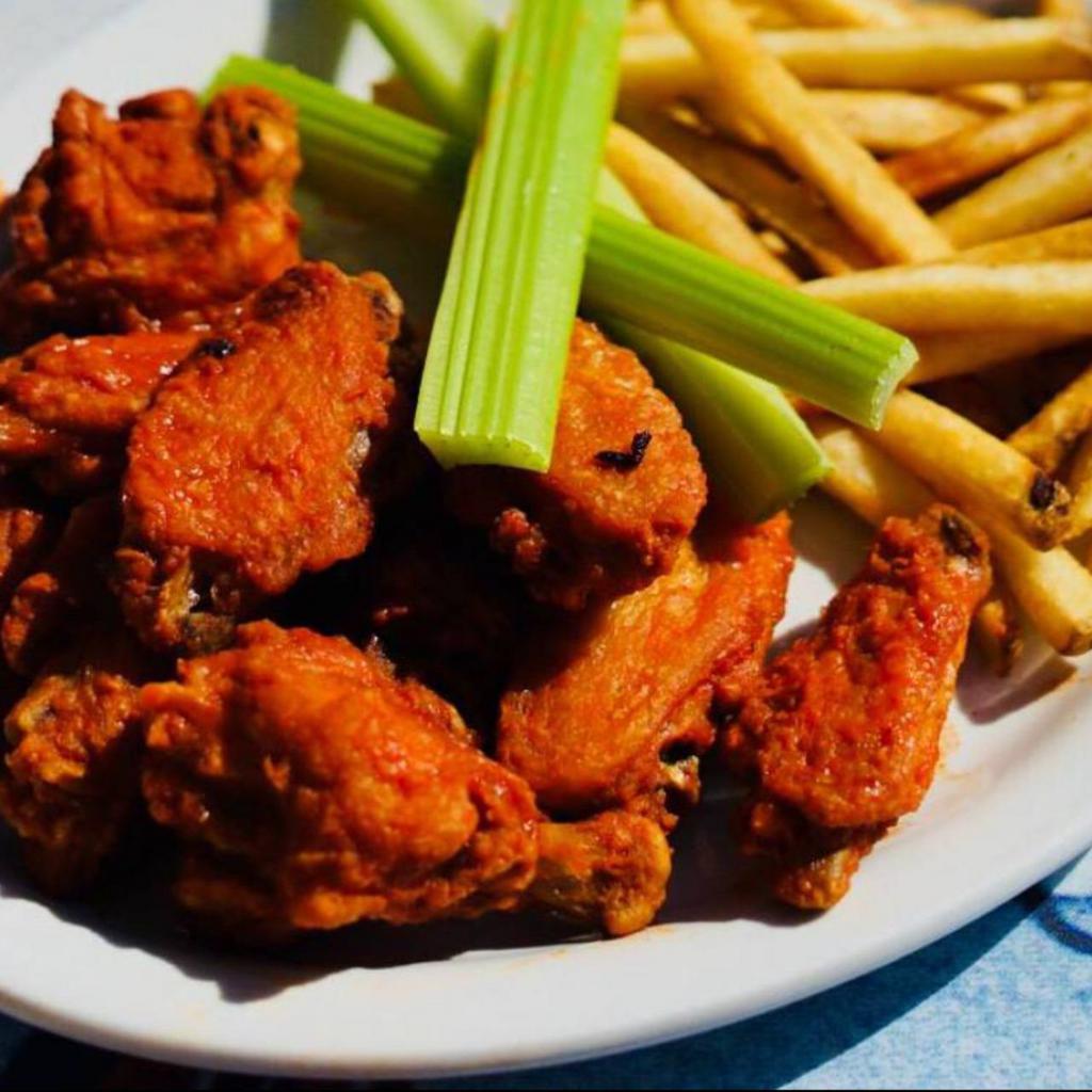 Wahoo’s Wings. · one pound of our large wings tossed on Buffalo, spicy bbq or sweet bbq sauce served fries and dressing on the side.