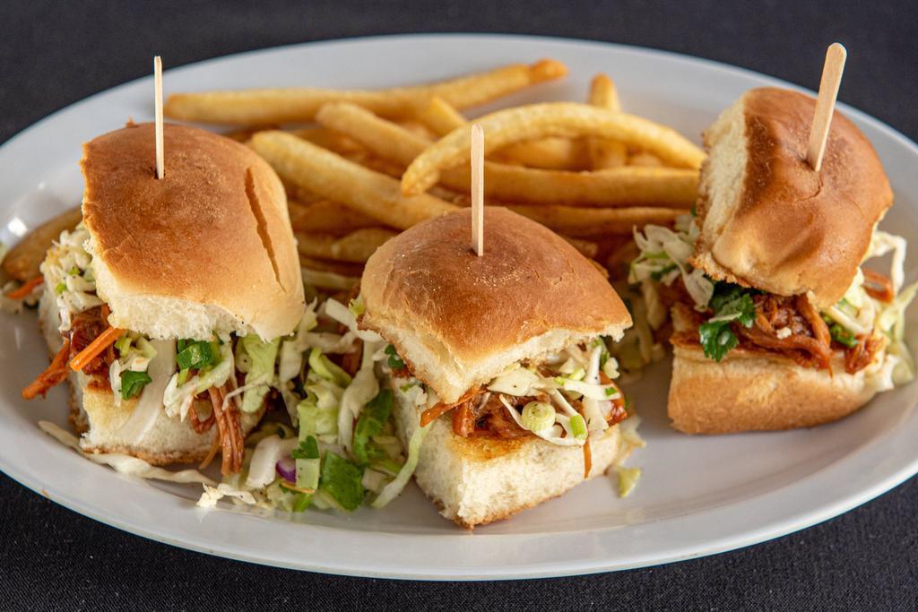 Bbq Sliders. · Prepared to perfection Hawaiian sweet rolls with BBQ pulled pork and citrus slaw served with Cajun Fries