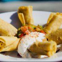 Taquitos. · 3 rolled flash fried corn taquitos with Chicken or Steak served with guacamole, sour cream a...
