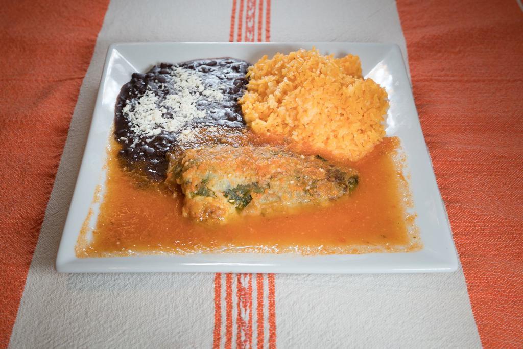 45. Chiles Rellenos de Pollo · Queso chili peppers stuffed with chicken and cheese. Served with rice and beans.