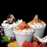 Sundae · Chocolate, Vanilla, or Swirl Ice Cream.  Includes Whipped Cream and Cherry