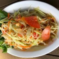 Papaya Salad · Fresh green papaya salad prepared in a mixture of lime juice, palm sugar, fresh Thai chilis,...