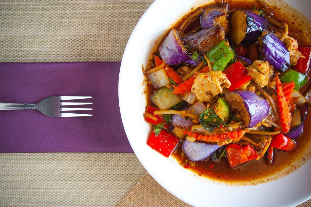Eggplant · Mixed veggies with eggplant in a light soy sauce.