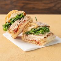 Sandwich No. 5 · House-roasted turkey, provolone, kale, red onion, tomato jam and herbed aioli.