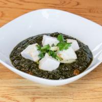 25. Saag Paneer · Paneer served with creamy spinach and garlic supple.