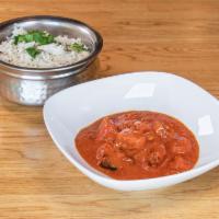 Butter Chicken Biryani · Perfect match of butter chicken  blend with spices and Basmati rice