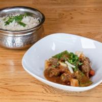43. Kadai Lamb · Lamb tossed with ginger, garlic, peppers and various spices.