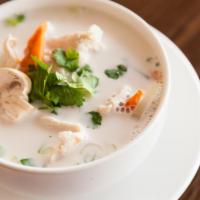 Tom Kha · Coconut milk with mushroom, onion, carrot and Thai spice. Your choice of chicken or vegetabl...