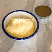 Small Mashers & Gravy · Classic mashed potatoes made with shallot butter and served with a side of our chicken gravy...