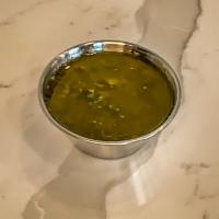 Side Chimichurri · 2 oz side of Chimichurri. An herbaceous sauce with parsley, oregano, cilantro and capers. Ve...