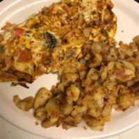 Veggie Omelette Breakfast · Green pepper, onion, tomato, mushrooms and American cheese. Served with home fries and choic...