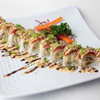 Maui Wowie Roll · Soft shell crab tempura, avocado, cream cheese, topped with tuna, spicy mayo, sweet soy, sca...