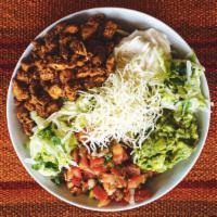Protein Burrito Bowl · Choice of protein, rice, black beans, lettuce, guacamole, pico de gallo, sour cream, and che...
