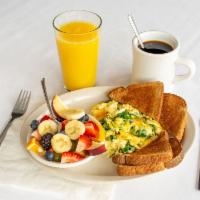Green Eggs Breakfast · 2 scrambled eggs with spinach and cheese, fresh fruit and wheat toast.