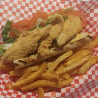 Catfish Po Boy · Fried Catfish, lettuce, tomato, pickle, and Cajun mayo on a baguette.