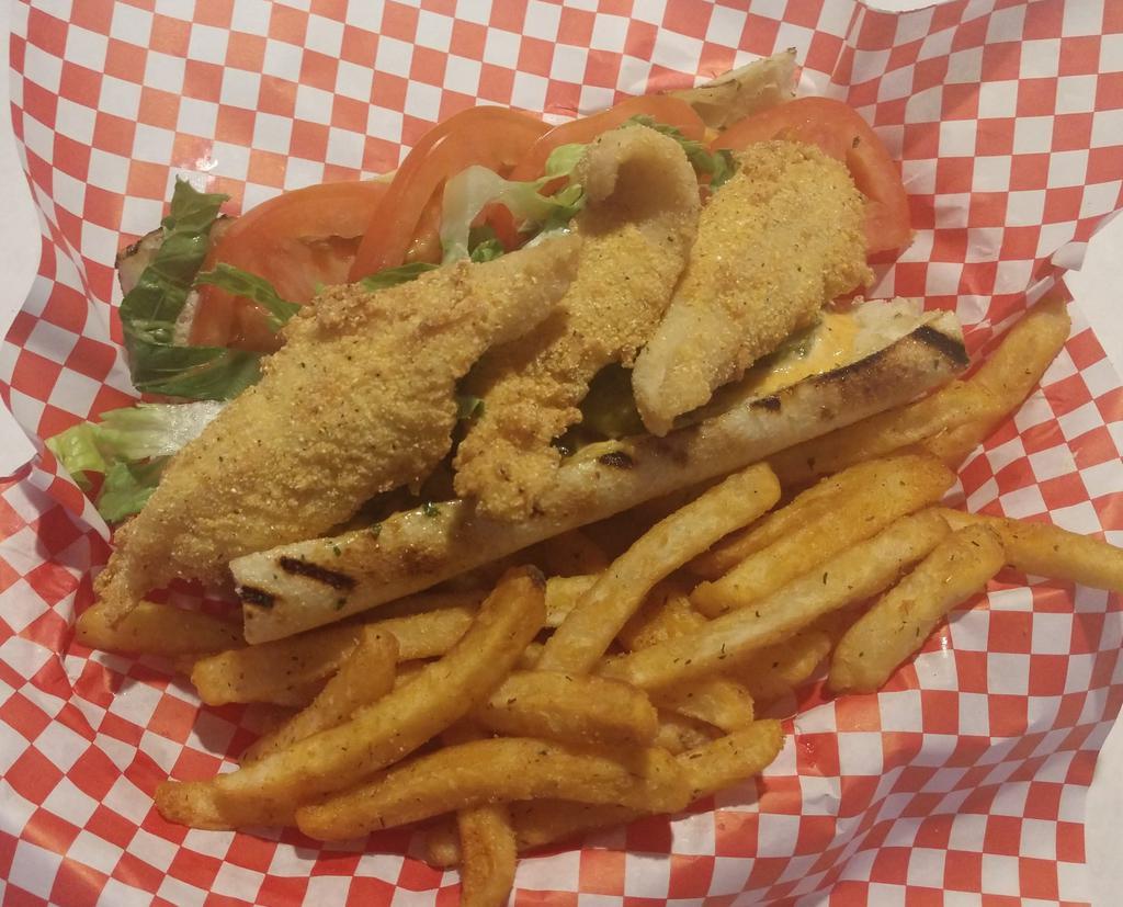 Catfish Po Boy · Fried Catfish, lettuce, tomato, pickle, and Cajun mayo on a baguette.