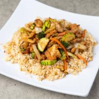 Teriyaki Chicken · Dark meat chicken grilled then tossed in teriyaki sauce. Served with egg fried rice and vege...