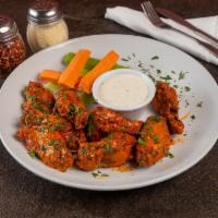 3/4 lb. Buffalo Wings  · Cooked wing of a chicken coated in sauce or seasoning.