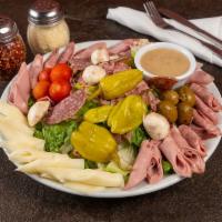 Antipasto Salad · Crisp lettuce, deli cheeses and meats, pepperoncini, mushrooms, olives and ripe tomatoes. Se...