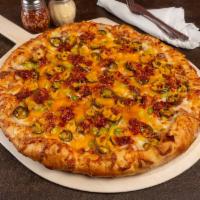 Pizza Mexicana · Refried beans, chorizo, bell pepper, onion, jalapeno, mozzarella, and cheddar.