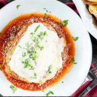 Eggplant Parmigiana · Layers of thinly sliced eggplant in a delicate batter with choice of meat or marinara sauce,...