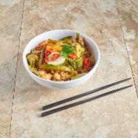 R4. Basil Fried Rice · Served with bell peppers, onions, pepper, string beans, egg and basil leaves. Hot and spicy.
