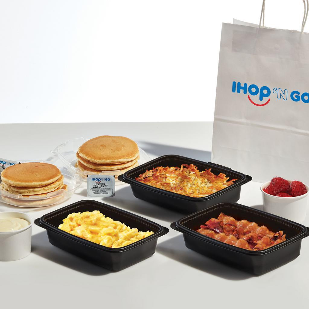 Pancake Creations Family Feast with Bacon · 8 of our world famous buttermilk pancakes, 4 servings each of scrambled eggs and golden hash browns, 8 hickory-smoked bacon strips, and choice of 2 pancake toppings. Serves 4. Available for IHOP ‘N GO only. Not available for dine-in.